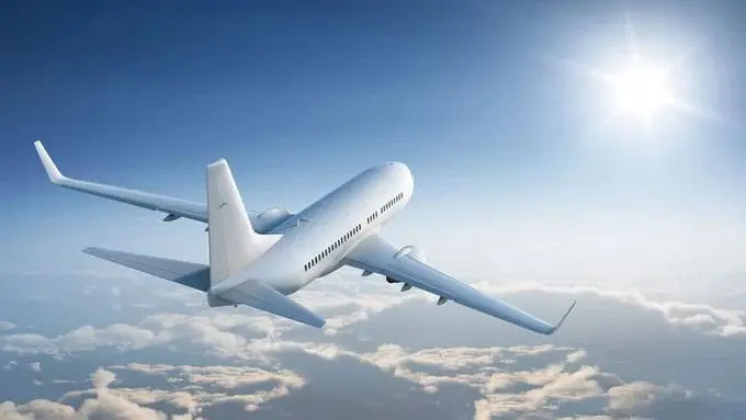 An airplane flying through the sky