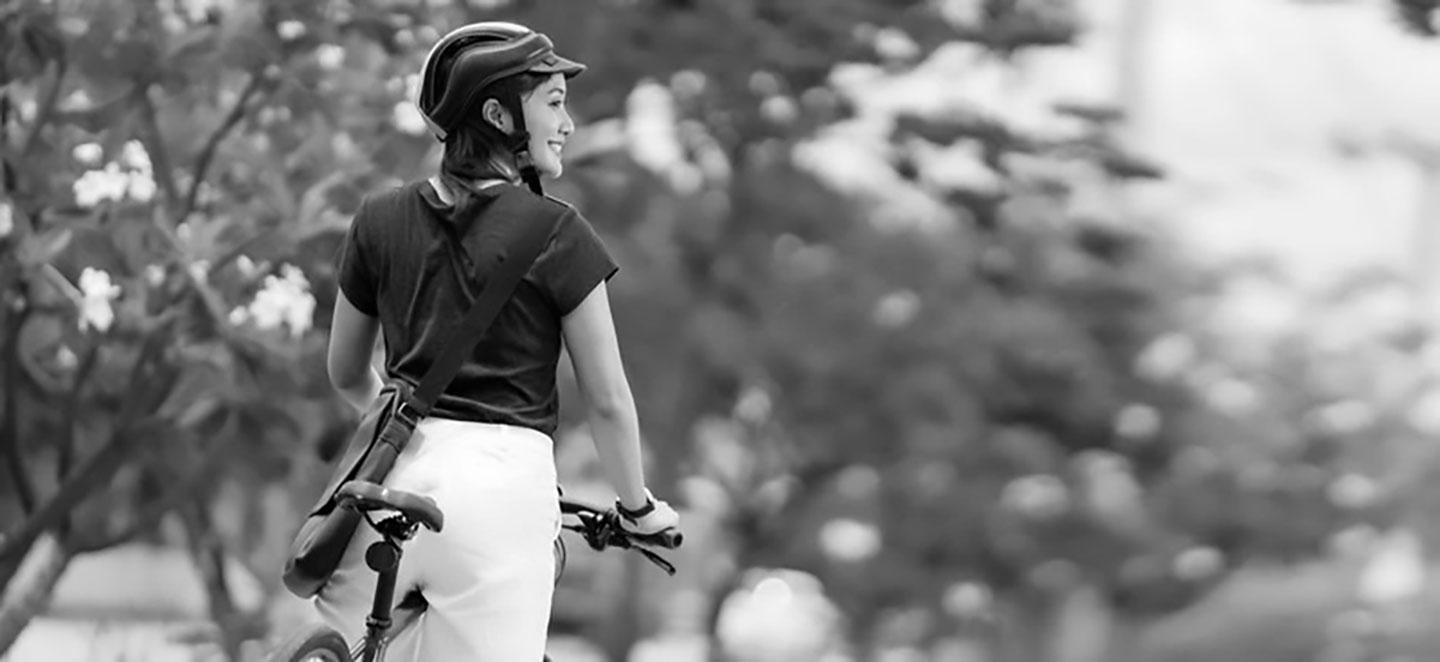 A woman on a bike