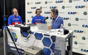 Three men recording a podcast episode during CAMX 2024